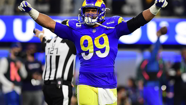 Jan 30, 2022; Inglewood, California, USA; Los Angeles Rams defensive end Aaron Donald (99) celebrates in the fourth quarter during the NFC Championship Game against the San Francisco 49ers at SoFi Stadium. Mandatory Credit: Gary A. Vasquez-USA TODAY Sports