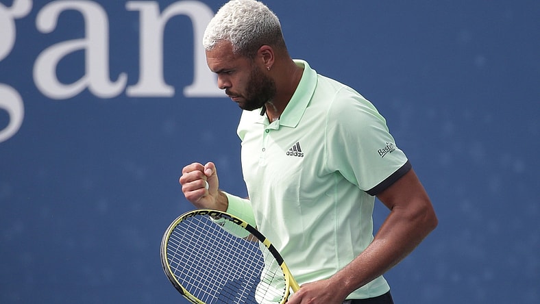 Aug 27, 2019; Flushing, NY, USA; Jo-Wilfried Tsonga of France reacts after winning a point against Tennys Sandgren of the United States in a first round match on day two of the 2019 U.S. Open tennis tournament at USTA Billie Jean King National Tennis Center. Mandatory Credit: Jerry Lai-USA TODAY Sports
