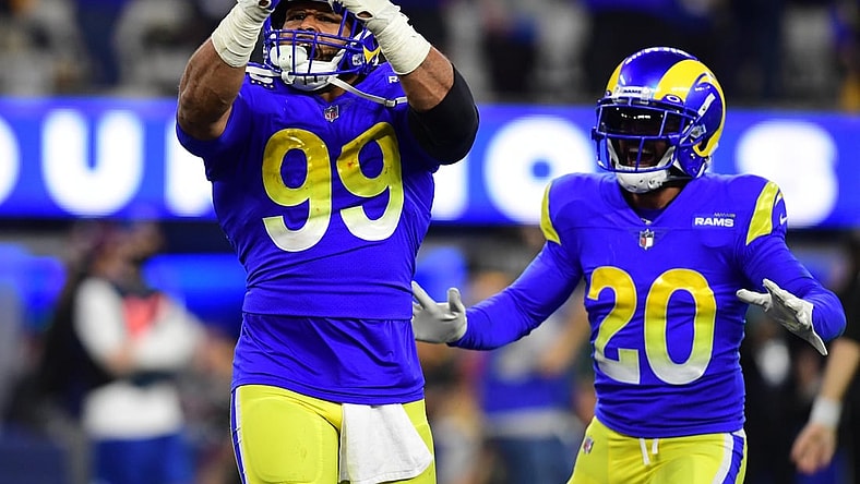 Jan 30, 2022; Inglewood, California, USA; Los Angeles Rams defensive end Aaron Donald (99) celebrates in the fourth quarter during the NFC Championship Game against the San Francisco 49ers at SoFi Stadium. Mandatory Credit: Gary A. Vasquez-USA TODAY Sports