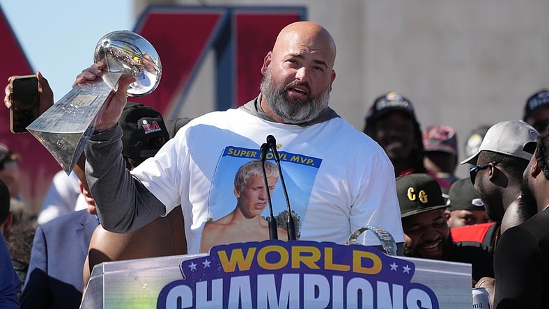 Feb 16, 2022; Los Angeles, CA, USA; Los Angeles Rams tackle Andrew Whitworth holds the Vince Lombardi trophy during the Super Bowl LVI championship rally at the Los Angeles Memorial Coliseum. Mandatory Credit: Kirby Lee-USA TODAY Sports
