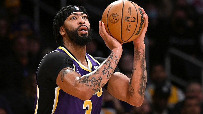 Feb 16, 2022; Los Angeles, California, USA; Los Angeles Lakers forward Anthony Davis (3) lines up a shot in the first half against the Utah Jazz at Crypto.com Arena. Mandatory Credit: Jayne Kamin-Oncea-USA TODAY Sports