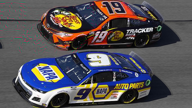 Feb 20, 2022; Daytona Beach, Florida, USA; NASCAR Cup Series driver Martin Truex Jr. (19) and driver Chase Elliott (9) race side by side during the Daytona 500 at Daytona International Speedway. Mandatory Credit: Mike Dinovo-USA TODAY Sports