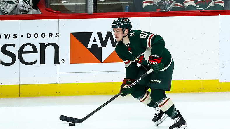 Dec 14, 2019; Saint Paul, MN, USA; Minnesota Wild defenseman Brennan Menell (61) skates with the puck in the third period against the Philadelphia Flyers at Xcel Energy Center. Mandatory Credit: David Berding-USA TODAY Sports