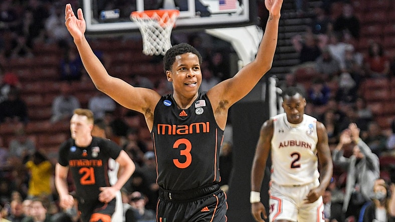 University of Miami guard Charlie Moore (3) celebrates after teammate forward Sam Waardenburg (21) dunked against Auburn University during the second half of the NCAA Div. 1 Men's Basketball Tournament preliminary round game at Bon Secours Wellness Arena in Greenville, S.C. Sunday, March 20, 2022.
Ncaa Mens Basketball Second Round Miami Vs Auburn