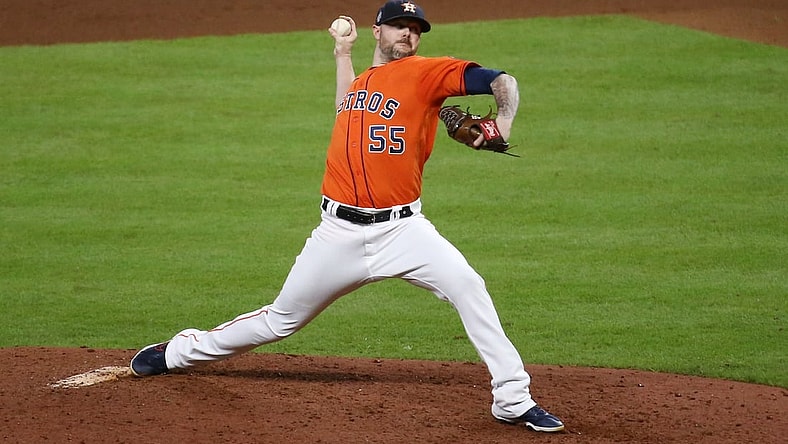 Oct 27, 2021; Houston, TX, USA; Houston Astros relief pitcher Ryan Pressly throws a pitch against the Atlanta Braves during the eighth inning in game two of the 2021 World Series at Minute Maid Park. Mandatory Credit: Troy Taormina-USA TODAY Sports