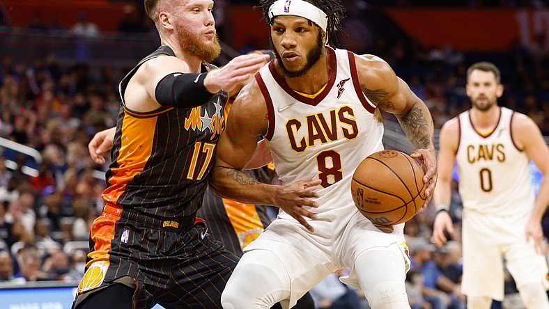 Apr 5, 2022; Orlando, Florida, USA; Cleveland Cavaliers forward Lamar Stevens (8) drives to the basket guarded by Orlando Magic forward Ignas Brazdeikis (17) in the first half at Amway Center. Mandatory Credit: Nathan Ray Seebeck-USA TODAY Sports
