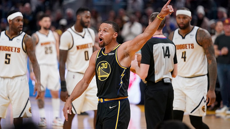 Apr 16, 2022; San Francisco, California, USA; Golden State Warriors guard Stephen Curry (30) interacts with fans after a foul call against the Denver Nuggets in the third quarter during game one of the first round for the 2022 NBA playoffs at the Chase Center. Mandatory Credit: Cary Edmondson-USA TODAY Sports