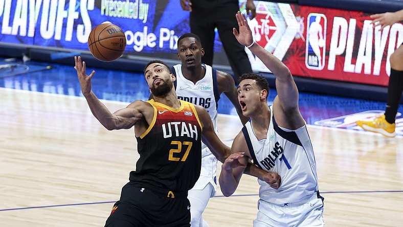 Apr 18, 2022; Dallas, Texas, USA; Utah Jazz center Rudy Gobert (27) grabs the ball in front of Dallas Mavericks center Dwight Powell (7) during the first quarter in game two of the first round of the 2022 NBA playoffs at American Airlines Center. Mandatory Credit: Kevin Jairaj-USA TODAY Sports