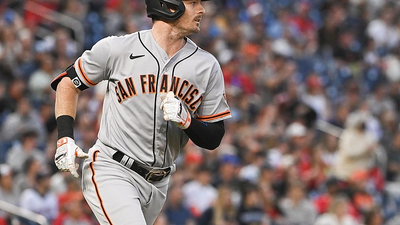 Apr 22, 2022; Washington, District of Columbia, USA;  San Francisco Giants right fielder Mike Yastrzemski (5) singles in the second inning against the Washington Nationals at Nationals Park. Mandatory Credit: Tommy Gilligan-USA TODAY Sports