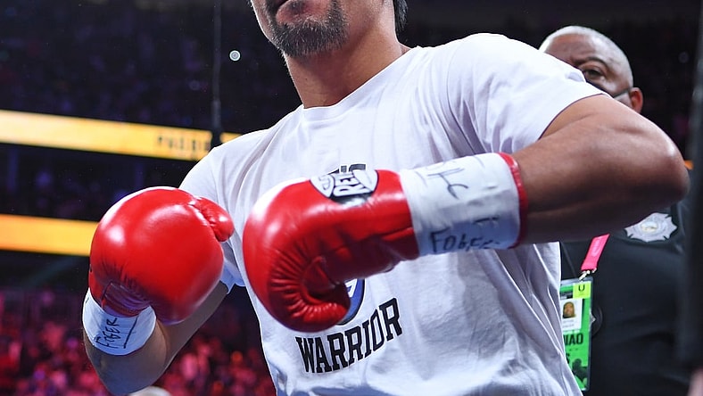 Aug 21, 2021; Las Vegas, Nevada; Manny Pacquiao is pictured before the start of a world welterweight championship bout against Yordenis Ugas at T-Mobile Arena. Mandatory Credit: Stephen R. Sylvanie-USA TODAY Sports