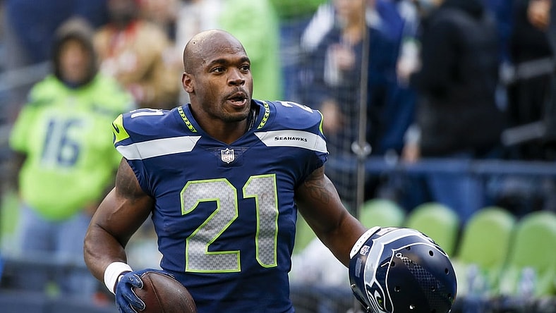 Dec 5, 2021; Seattle, Washington, USA; Seattle Seahawks running back Adrian Peterson (21) returns to the locker room following pregame warmups against the San Francisco 49ers at Lumen Field. Mandatory Credit: Joe Nicholson-USA TODAY Sports