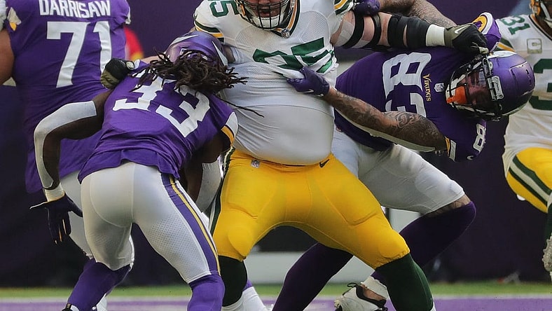 Green Bay Packers defensive tackle Tyler Lancaster (95) fends off a block while tackling Minnesota Vikings running back Dalvin Cook (33) for a three-yard loss during the first  quarter of their game Sunday, November 21, 2021 at U.S. Bank Stadium in Minneapolis, Minn. The Minnesota Vikings beat the Green Bay Packers 34-31.

Mjs Packers22 12 Jpg Packers22