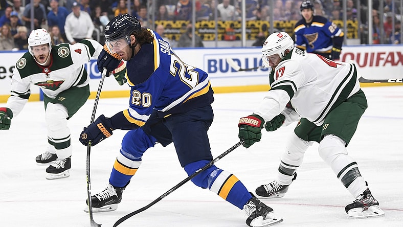 May 8, 2022; St. Louis, Missouri, USA; St. Louis Blues left wing Brandon Saad (20) takes a shot against the Minnesota Wild during the first period in game four of the first round of the 2022 Stanley Cup Playoffs at Enterprise Center. Mandatory Credit: Jeff Le-USA TODAY Sports