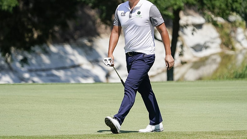 May 15, 2022; McKinney, Texas, USA; K.H. Lee  walks to the first green during the final round of the AT&T Byron Nelson golf tournament. Mandatory Credit: Raymond Carlin III-USA TODAY Sports