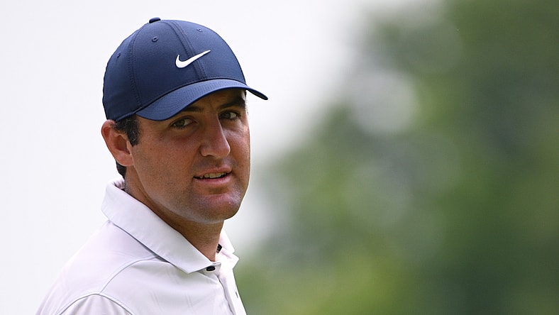 May 17, 2022; Tulsa, Oklahoma, USA; Scottie Scheffler looks on during a practice round for the PGA Championship golf tournament at Southern Hills Country Club. Mandatory Credit: Orlando Ramirez-USA TODAY Sports