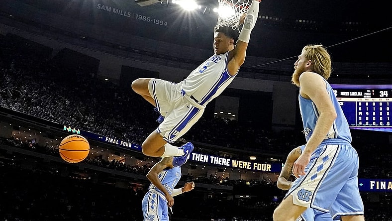 Apr 2, 2022; New Orleans, LA, USA; Duke Blue Devils forward Paolo Banchero (5) dunks the ball against North Carolina Tar Heels forward Brady Manek (45) during the second half in the 2022 NCAA men's basketball tournament Final Four semifinals at Caesars Superdome. Mandatory Credit: Robert Deutsch-USA TODAY Sports