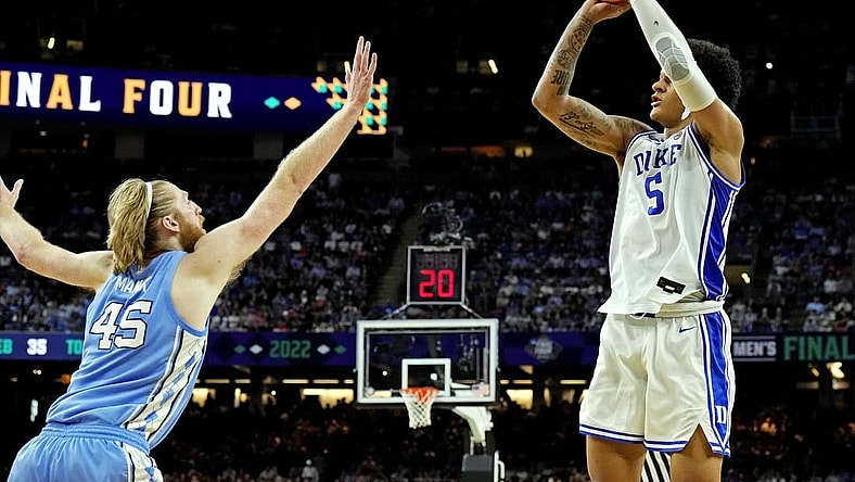 Apr 2, 2022; New Orleans, LA, USA; Duke Blue Devils forward Paolo Banchero (5) shoots the ball against North Carolina Tar Heels forward Brady Manek (45) in the 2022 NCAA men's basketball tournament Final Four semifinals at Caesars Superdome. Mandatory Credit: Robert Deutsch-USA TODAY Sports
