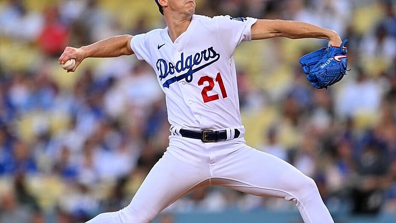 May 13, 2022; Los Angeles, California, USA; Los Angeles Dodgers starting pitcher Walker Buehler (21) pitches in the second inning against the Philadelphia Phillies at Dodger Stadium. Mandatory Credit: Jayne Kamin-Oncea-USA TODAY Sports
