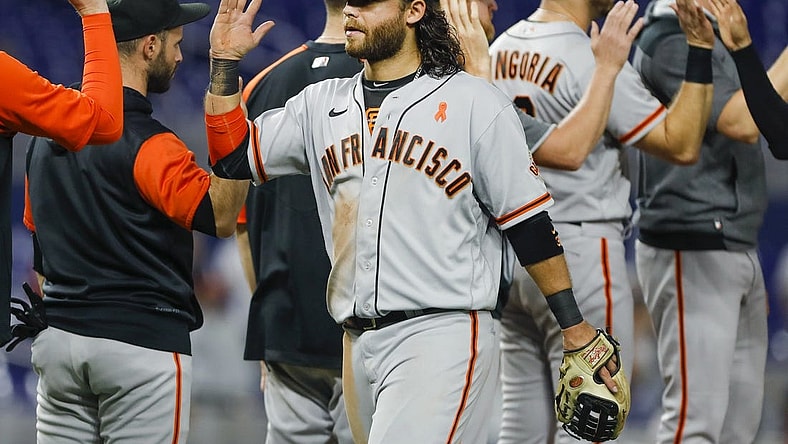Jun 3, 2022; Miami, Florida, USA; San Francisco Giants shortstop Brandon Crawford (35) celebrates with teammates after winning the game against the Miami Marlins at loanDepot Park. Mandatory Credit: Sam Navarro-USA TODAY Sports