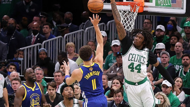 Jun 16, 2022; Boston, Massachusetts, USA; Boston Celtics center Robert Williams III (44) defends a shot from Golden State Warriors guard Klay Thompson (11) during the second quarter of game six in the 2022 NBA Finals at the TD Garden. Mandatory Credit: Paul Rutherford-USA TODAY Sports
