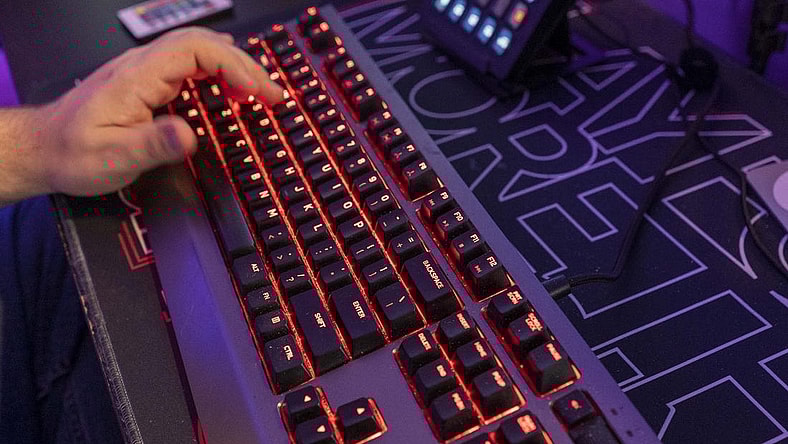 A backlit keyboard is part of the gear online video game streamer Jordan Woodruff uses in his Gilbert home.
Jordan Woodruff