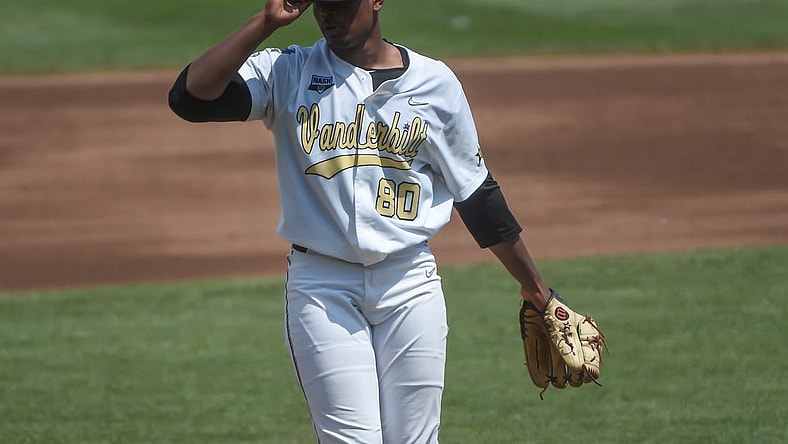 Jun 25, 2021; Omaha, Nebraska, USA; Vanderbilt Commodores starting pitcher Kumar Rocker (80) pitches in the second inning against the NC State Wolfpack at TD Ameritrade Park. Mandatory Credit: Steven Branscombe-USA TODAY Sports