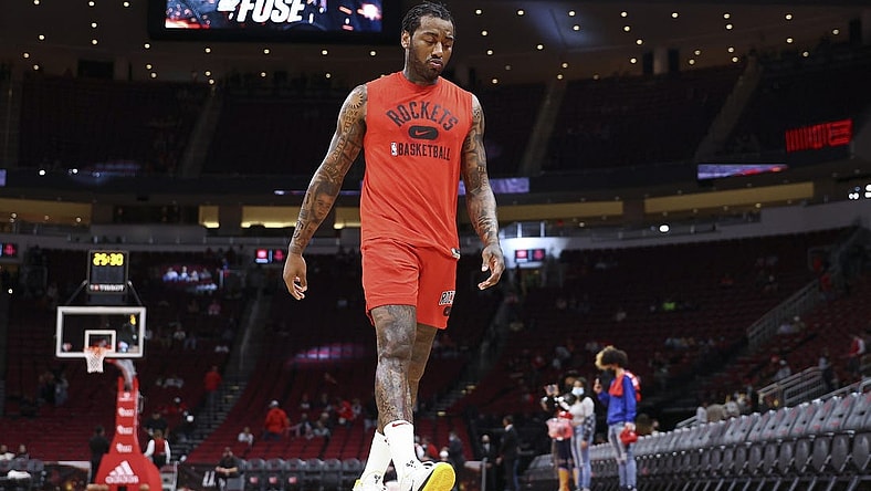 Nov 24, 2021; Houston, Texas, USA; Houston Rockets guard John Wall (1) walks on the court before the game against the Chicago Bulls at Toyota Center. Mandatory Credit: Troy Taormina-USA TODAY Sports