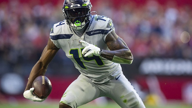 Jan 9, 2022; Glendale, Arizona, USA; Seattle Seahawks wide receiver DK Metcalf (14) against the Arizona Cardinals at State Farm Stadium. Mandatory Credit: Mark J. Rebilas-USA TODAY Sports