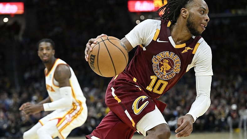 Apr 15, 2022; Cleveland, Ohio, USA; Cleveland Cavaliers guard Darius Garland (10) drives the baseline in the third quarter against the Atlanta Hawks at Rocket Mortgage FieldHouse. Mandatory Credit: David Richard-USA TODAY Sports
