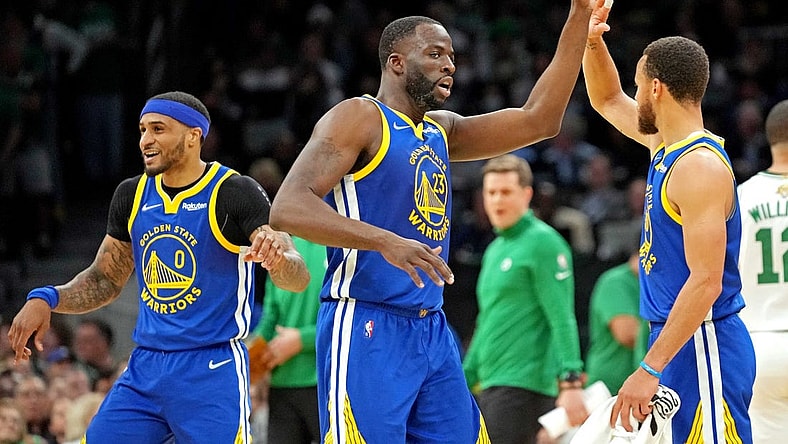 Jun 16, 2022; Boston, Massachusetts, USA; Golden State Warriors forward Draymond Green (23) reacts with guard Stephen Curry (30) during the second quarter against the Boston Celtics in game six of the 2022 NBA Finals at TD Garden. Mandatory Credit: Kyle Terada-USA TODAY Sports