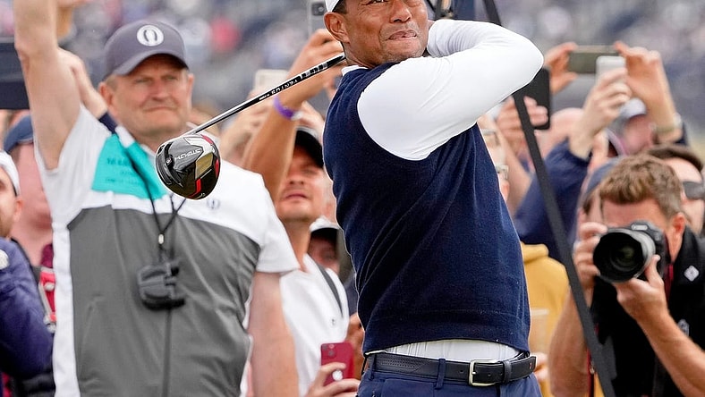 Jul 14, 2022; St. Andrews, SCT; Tiger Woods tees off on the fourth hole during the first round of the 150th Open Championship golf tournament at St. Andrews Old Course. Mandatory Credit: Michael Madrid-USA TODAY Sports