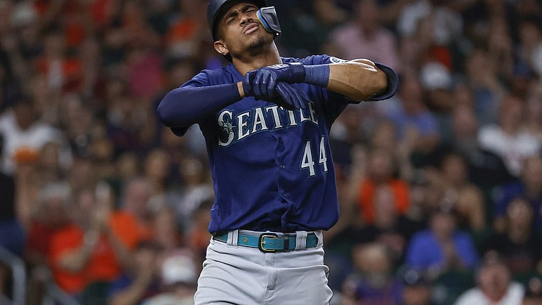 Jul 30, 2022; Houston, Texas, USA; Seattle Mariners center fielder Julio Rodriguez (44) reacts after an apparent injury during the eighth inning against the Houston Astros at Minute Maid Park. Mandatory Credit: Troy Taormina-USA TODAY Sports
