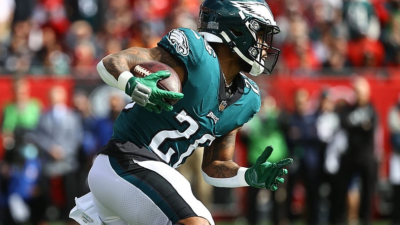 Jan 16, 2022; Tampa, Florida, USA;Philadelphia Eagles running back Miles Sanders (26) runs with the ball against the Tampa Bay Buccaneers during the first quarter in a NFC Wild Card playoff football game at Raymond James Stadium. Mandatory Credit: Kim Klement-USA TODAY Sports