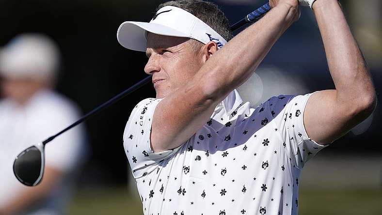 Feb 4, 2022; Pebble Beach, California, USA; Luke Donald plays his shot on the sixth tee during the second round of the AT&T Pebble Beach Pro-Am golf tournament at Pebble Beach Golf Links. Mandatory Credit: Ray Acevedo-USA TODAY Sports