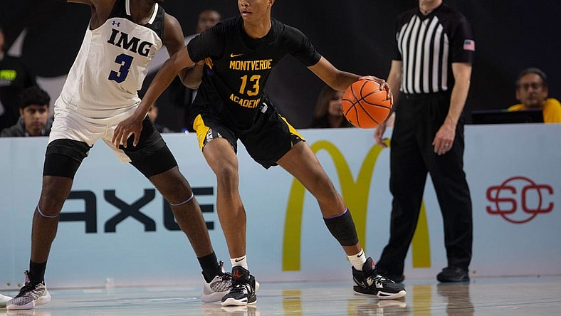 Montverde Academy's Kwame Evans Jr. (13) backs down IMG Academy's Eric Dailey Jr. (3) during the second half of the GEICO Nationals semifinal between Montverde Academy and IMG Academy, Friday, April 1, 2022, at Suncoast Credit Union Arena in Fort Myers, Fla.Montverde Academy defeated IMG Academy 62-57.

GEICO Nationals 2022: Montverde Academy (Fla.) vs. IMG Academy (Fla.) semifinal, April 1, 2022