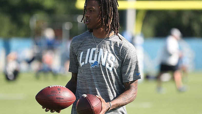 Detroit Lions receiver Jameson Williams watches passing drills during practice Thursday, July 28, 2022 at the Allen Park practice facility.Lions1
