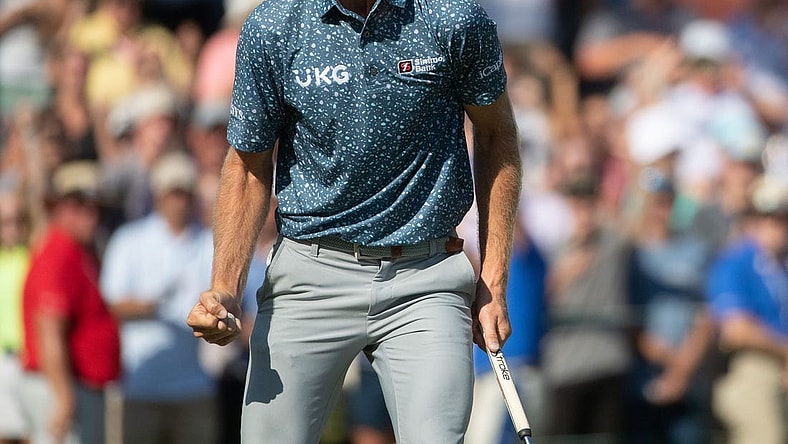 Will Zalatoris reacts after making a par putt on No. 18 during the final round of the FedEx St. Jude Championship on Sunday, Aug. 14, 2022, at TPC Southwind in Memphis.