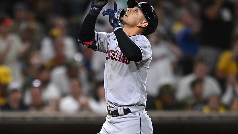Aug 23, 2022; San Diego, California, USA; Cleveland Guardians second baseman Andres Gimenez (0) gestures while rounding the bases after hitting a home run against the San Diego Padres during the fifth inning at Petco Park. Mandatory Credit: Orlando Ramirez-USA TODAY Sports