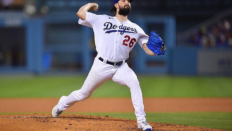 Aug 23, 2022; Los Angeles, California, USA; Los Angeles Dodgers starting pitcher Tony Gonsolin (26) throws against the Milwaukee Brewers during the third inning at Dodger Stadium. Mandatory Credit: Gary A. Vasquez-USA TODAY Sports