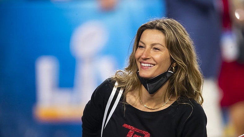 Feb 7, 2021; Tampa, FL, USA; Gisele Bundchen , wife of Tampa Bay Buccaneers quarterback Tom Brady (not pictured) celebrates after defeating the Kansas City Chiefs in Super Bowl LV at Raymond James Stadium. Mandatory Credit: Mark J. Rebilas-USA TODAY Sports