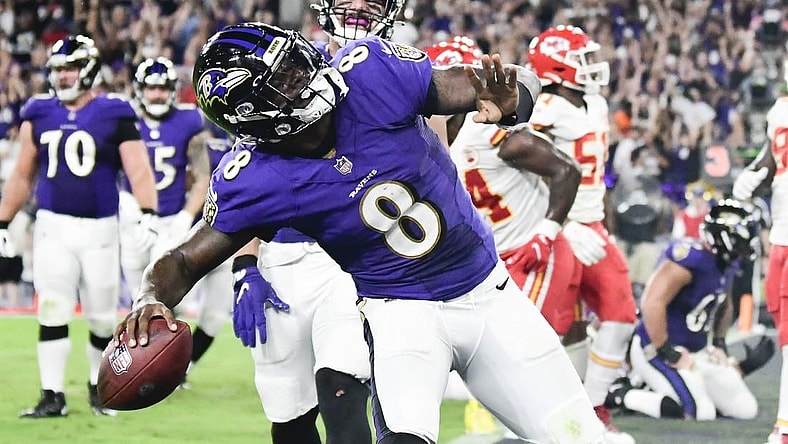 Sep 19, 2021; Baltimore, Maryland, USA; Baltimore Ravens quarterback Lamar Jackson (8) celebrates scoring a fourth quarter touchdown against the Kansas City Chiefs at M&T Bank Stadium. Mandatory Credit: Tommy Gilligan-USA TODAY Sports