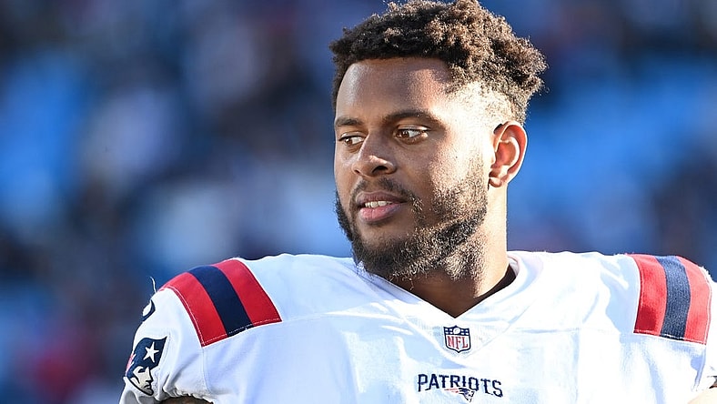Nov 7, 2021; Charlotte, North Carolina, USA; New England Patriots offensive tackle Justin Herron (75) on the sidelines in the fourth quarter at Bank of America Stadium. Mandatory Credit: Bob Donnan-USA TODAY Sports