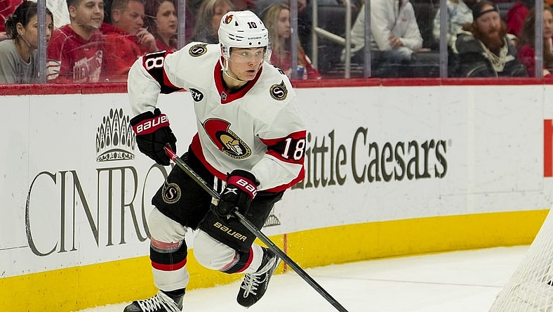 Apr 12, 2022; Detroit, Michigan, USA; Ottawa Senators left wing Tim Stutzle (18) skates with the puck during the second period against the Detroit Red Wings at Little Caesars Arena. Mandatory Credit: Raj Mehta-USA TODAY Sports