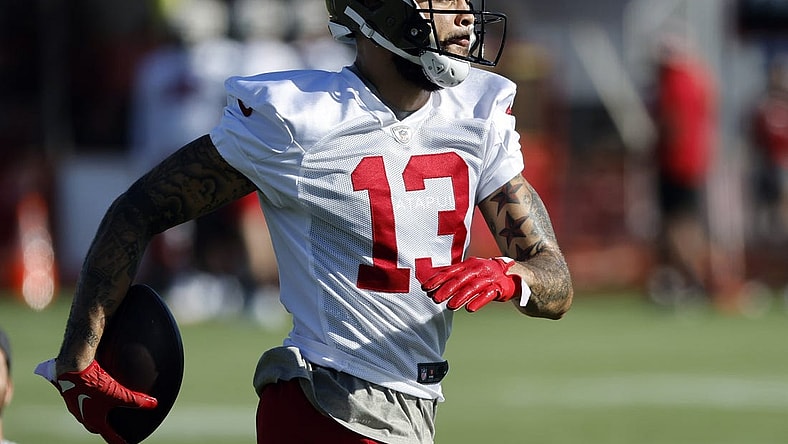 Jul 27, 2022; Tampa, FL, USA;  Tampa Bay Buccaneers wide receiver Mike Evans (13) works out during training camp at Advent Health Training Complex. Mandatory Credit: Kim Klement-USA TODAY Sports