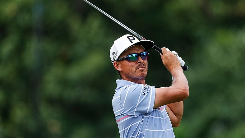 Rickie Fowler tees on the ninth hole during Round 2 of the Rocket Mortgage Classic at the Detroit Golf Club in Detroit on Friday, July 29, 2022.