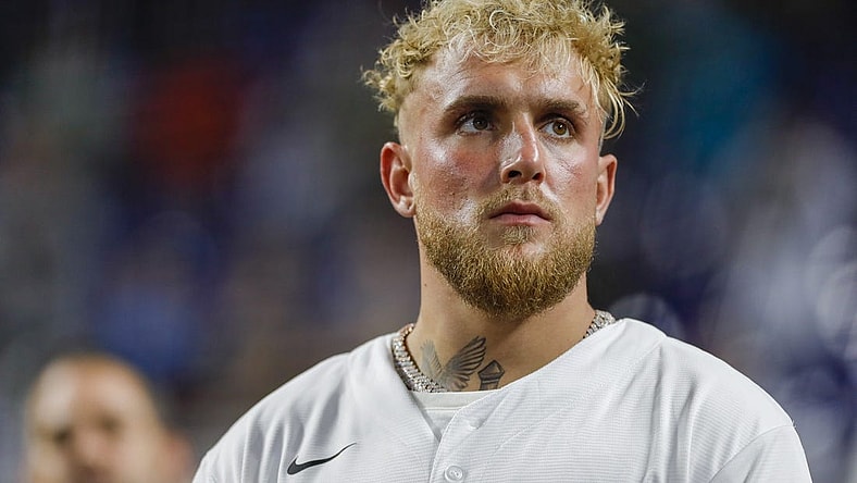Aug 16, 2022; Miami, Florida, USA; YouTube personality and boxer Jake Paul listens to the national anthem prior to the game between the Miami Marlins and the San Diego Padres at loanDepot Park. Mandatory Credit: Sam Navarro-USA TODAY Sports