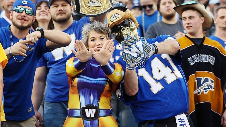 Aug 25, 2022; Winnipeg, Manitoba, CAN;  Winnipeg Blue Bombers fans react during the first half against the Calgary Stampeders at IG Field. Mandatory Credit: Bruce Fedyck-USA TODAY Sports