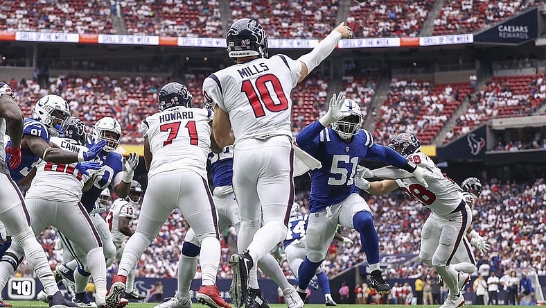 Sep 11, 2022; Houston, Texas, USA; Indianapolis Colts defensive end Kwity Paye (51) applies defensive pressure as Houston Texans quarterback Davis Mills (10) attempts a pass during the second quarter at NRG Stadium. Mandatory Credit: Troy Taormina-USA TODAY Sports