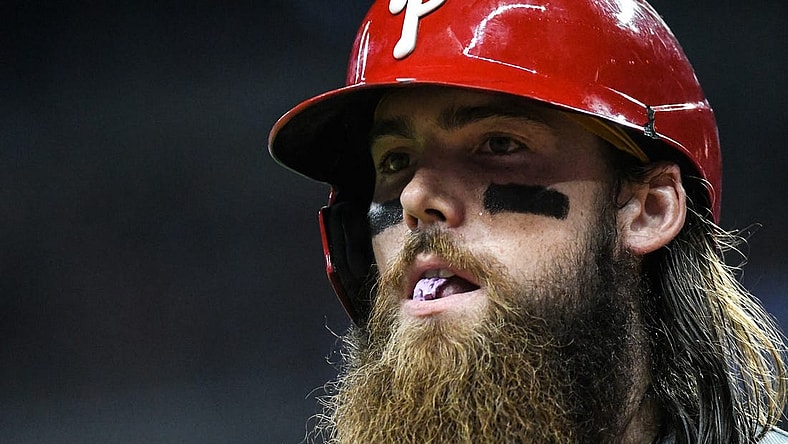 Sep 17, 2022; Cumberland, Georgia, USA; Philadelphia Phillies center fielder Brandon Marsh (16) reacts after striking out against the Atlanta Braves in the sixth inning at Truist Park. Mandatory Credit: Larry Robinson-USA TODAY Sports