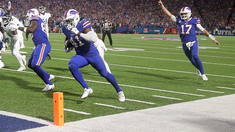 Bills fullback Reggie Gilliam his cheered to the end zone by Josh Allen n a 41-7 win over Tennessee.
Ag3i1365